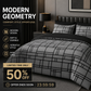 Moderna, minimalistiska sängkläder med geometriska mönster